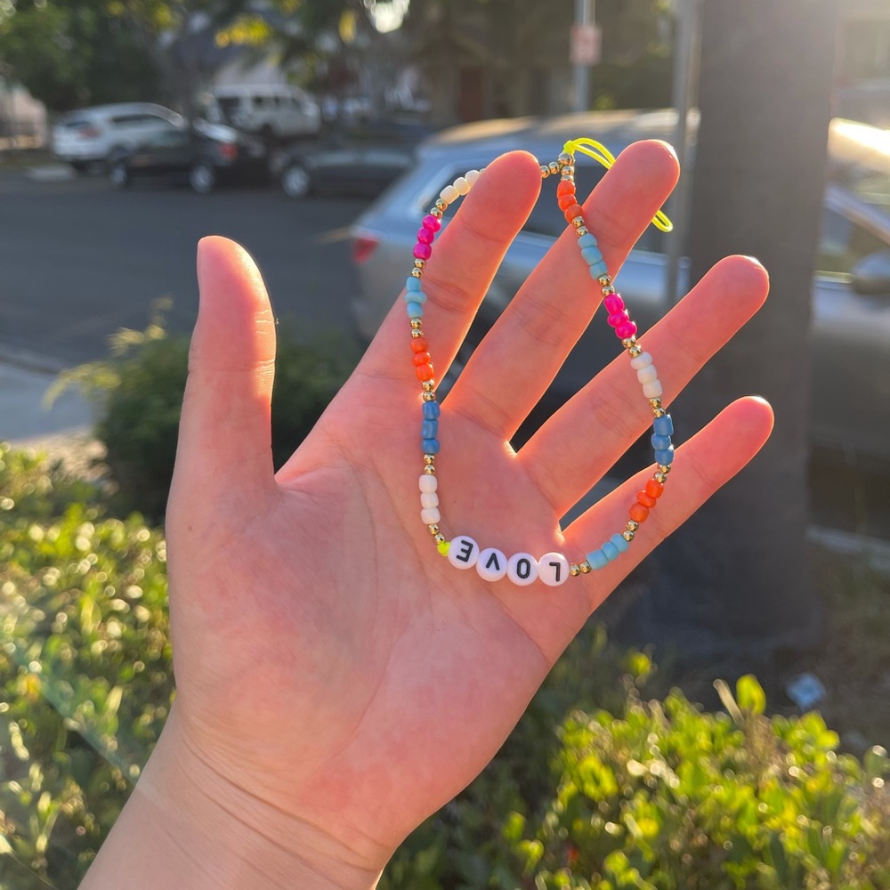 Beaded “LOVE” phone chain.